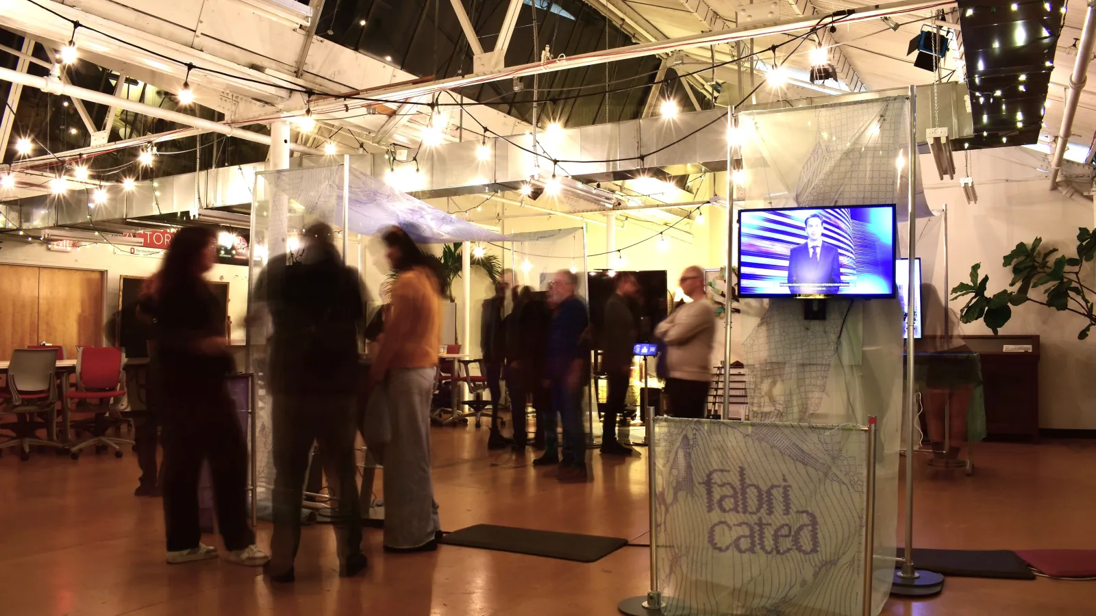people surrounding exhibit
